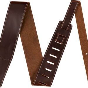 Fender's 2.5" Leather guitar strap offers a luxurious and comfortable feel. The sturdy genuine leather top sports an elegant oil finish while the backing is crafted from 5oz. cowhide leather. This strap adjusts from 44.5" to 53" long, making it ideal for guitarists of any height. Features 2.5"-wide guitar strap Crafted from oil leather Adjustable sizing from 44.5" to 53" Made in Canada