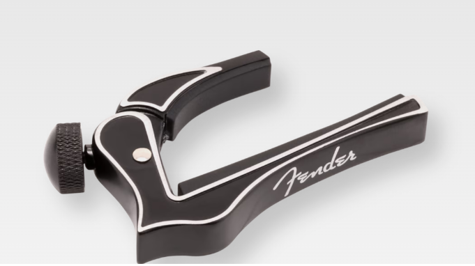 Simple to use and made with durable lightweight cast aluminum, the Dragon Capo delivers ideal capo performance anywhere along the neck of any acoustic or electric guitar. Convenient micro-dial thumbscrew lets you change positions quickly and easily with just the right pressure at any fret, and special protective pads won't harm neck finishes Features For 6-string electric guitars with radiused fretboards Clamps at any fret on the exposed fretboard Does not interfere with your playing No adjustments required