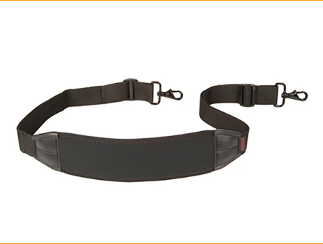 Comfortably carries heavy bags, briefcases, computer bags and luggage Unique internal control-stretch system makes loads feel up to 50% lighter Securely attaches to a wide variety of luggage with metal swivel hooks or 1.5" webbing (Mini S.O.S. uses 1" webbing) Stays in place with our Non Skid Surface Fully adjustable for added versatility Made in the USA The S.O.S. STRAP™ "Saves On Shoulders" with its unique internal control-stretch system and tailored design that effectively distributes weight and absorbs shock of movement. It's the perfect strap for heavy bags and cases. The metal swivel snap hooks secure the strap to most bags and cases; however, they can be easily removed if the 1.5" (38.1mm) webbing is the preferred connection option. It is now available in three versions. The S.O.S. STRAP™ has 2.75" by 11" neoprene pad with non-skid surface and 1.5" metal swivel hooks and webbing. The S.O.S. CURVE STRAP™ is the same as the S.O.S. STRAP™ except that it has a slight curve to the neoprene pad allowing the strap to rest more securely on the shoulder. The MINI S.O.S. STRAP™ has a slightly smaller neoprene pad (2.25" by 10") with non-skid surface and uses 1" webbing with metal swivel hooks. The MINI S.O.S. STRAP™ does not come in the color Nature.