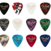 Fender picks provide comfort and high-performance flexibility for every performer, with a variety of classic and contemporary materials to suit the playing styles and preferences of every guitarist. The traditional 351 shape, our most popular pick design, is a perfect accessory for players of versatile styles and techniques. This twelve-pack of picks contains one crafted in each of these colors: Red Moto, Black Moto, White Moto, Blue Moto, Ocean Turquoise Moto, Green Moto, Purple Moto, Abalone, Tortoiseshell, Confetti, Solid White and Solid Black. Features 12-count Traditional 351 pick shape Available in various colors Made in the U.S.A.