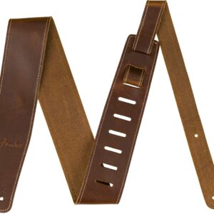 Fender's 2.5" Leather guitar strap offers a luxurious and comfortable feel. The sturdy genuine leather top sports an elegant oil finish while the backing is crafted from 5oz. cowhide leather. This strap adjusts from 44.5" to 53" long, making it ideal for guitarists of any height. Features 2.5"-wide guitar strap Crafted from oil leather Adjustable sizing from 44.5" to 53" Made in Canada